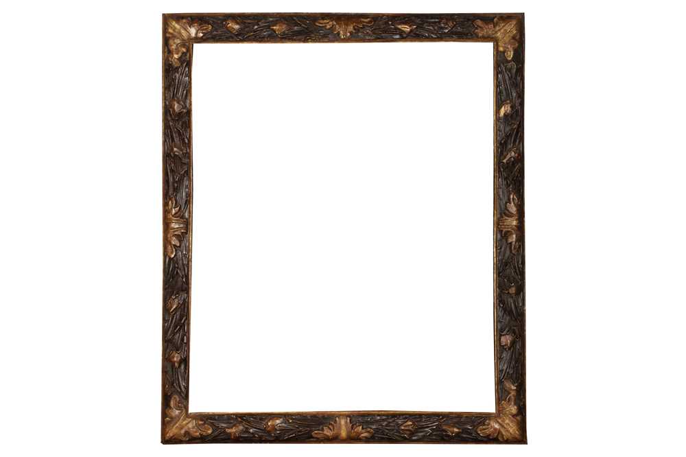 A BOLOGNESE 17TH CENTURY STYLE CARVED AND PARTIALLY GILDED FRAME