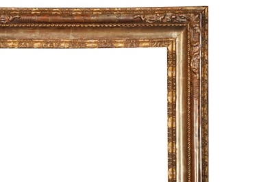 Lot 185 - A LOUIS XIV CARVED AND GILDED LEBRUN STYLE FRAME