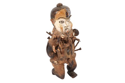 Lot 605 - A TRIBAL HARDWOOD FETISH FIGURE OF A MAN, POSSIBLY CONGO, 20TH CENTURY