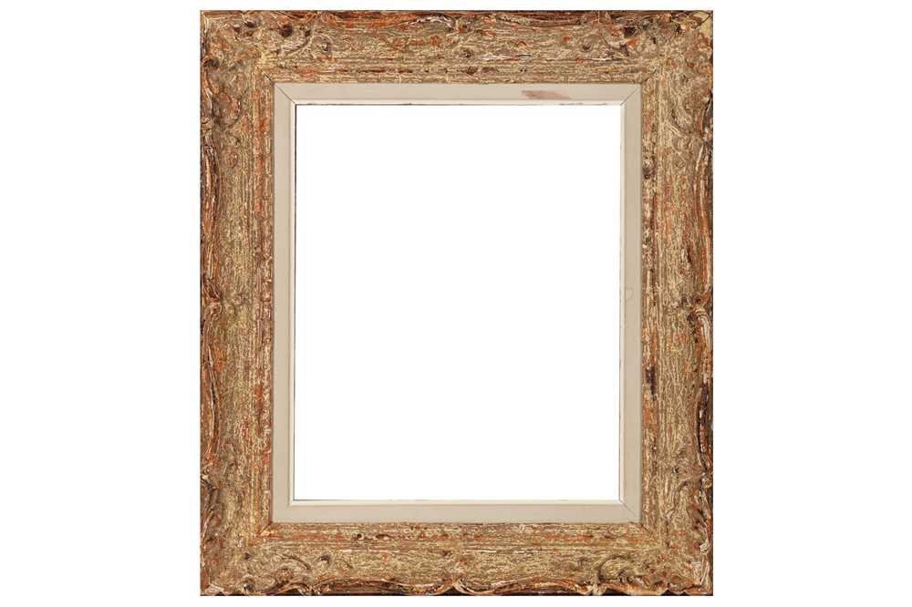 A PROVINCIAL LOUIS XIV STYLE CARVED AND PAINTED FRAME