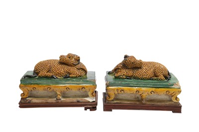 Lot 564 - A PAIR OF CHINESE SANCAI 'RAMS' ROOF TILES.