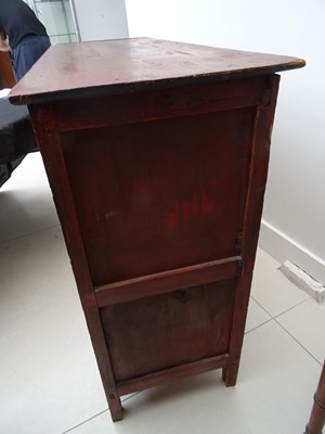 Lot 108 - A TIBETAN RED LACQUERED SIDE CABINET