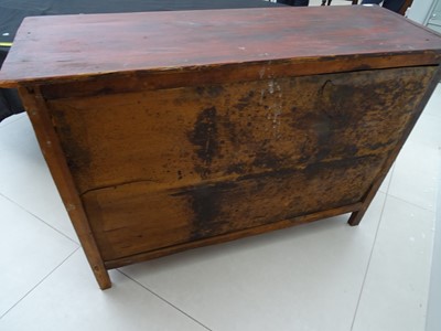 Lot 108 - A TIBETAN RED LACQUERED SIDE CABINET