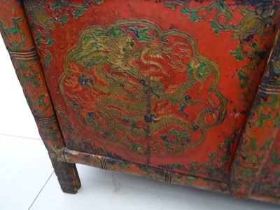 Lot 108 - A TIBETAN RED LACQUERED SIDE CABINET