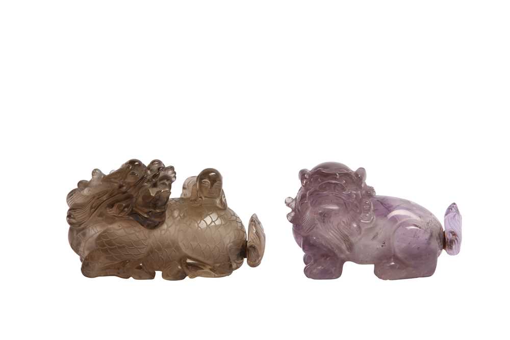 Lot 107 - TWO CHINESE HARDSTONE 'MYTHICAL BEASTS' SNUFF BOTTLES.