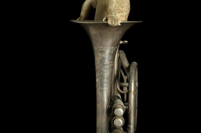 Lot 90 - TAXIDERMY ART:  LION CUB IN A TRUMPET BY ANDRE ROBOLOBAVICH