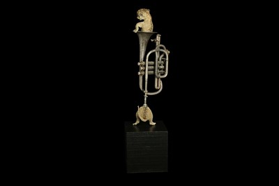 Lot 90 - TAXIDERMY ART:  LION CUB IN A TRUMPET BY ANDRE ROBOLOBAVICH