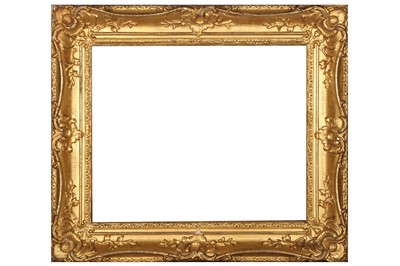 Lot 189 - A LOUIS XV STYLE SWEPT AND GILDED COMPOSITION FRAME