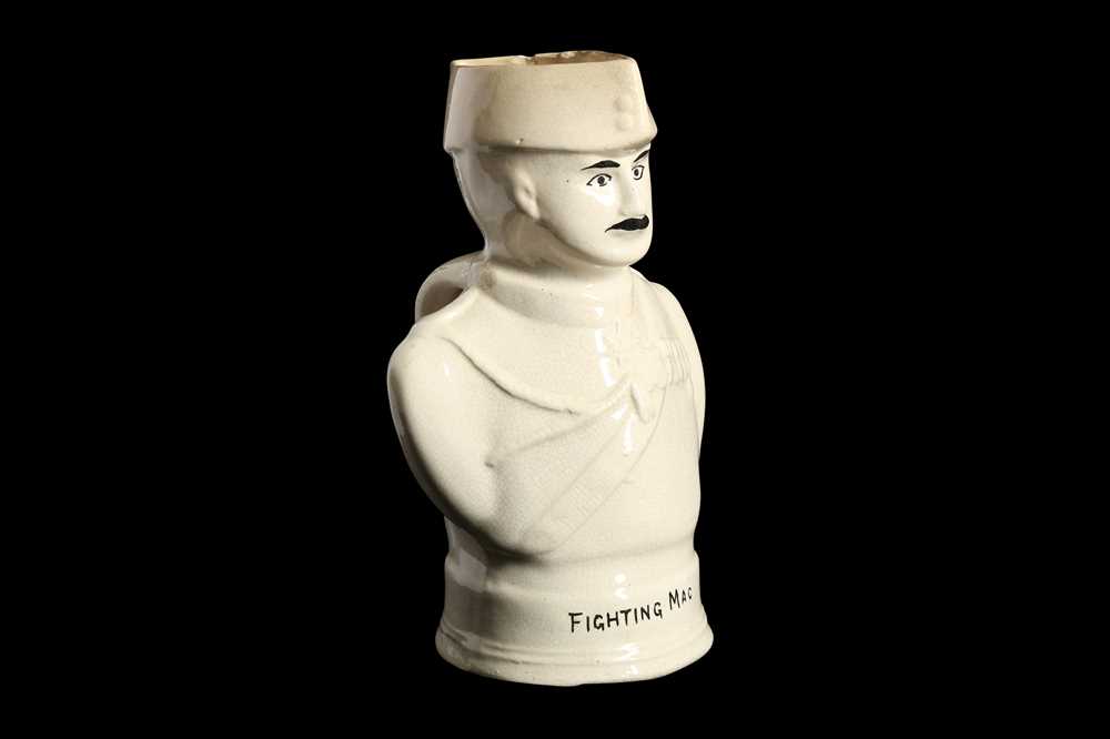 Lot 378 - A RARE COMMEMORATIVE JUG IN THE FORM OF 'FIGHTING MAC'