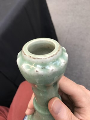 Lot 443 - A CHINESE BLUE AND WHITE CELADON-GROUND GARLIC MOUTH VASE.
