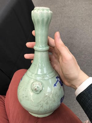 Lot 443 - A CHINESE BLUE AND WHITE CELADON-GROUND GARLIC MOUTH VASE.