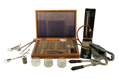Lot 5 - A SET OF OPTICIAN LENSES FROM THE LATE 19TH CENTURY TOGETHER WITH OTHER MEDICAL EQUIPMENT