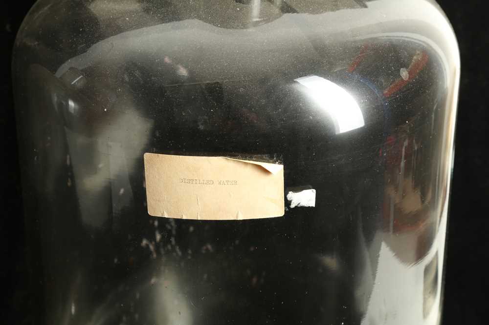 Lot 37 TWO GIANT GLASS JARS