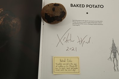 Lot 49 - VIKTOR WYND (BRITISH): A DESSICATED BAKED POTATO TOGETHER VIKTOR WYND'S BOOK