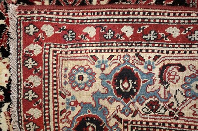 Lot 30 - AN ANTIQUE AGRA RUG, NORTH INDIA