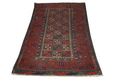 Lot 16 - AN ANTIQUE BALOUCH RUG, NORTH-EAST PERSIA