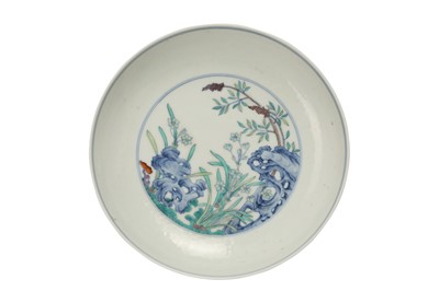 Lot 667 - A CHINESE DOUCAI 'WILD ORCHIDS' DISH.
