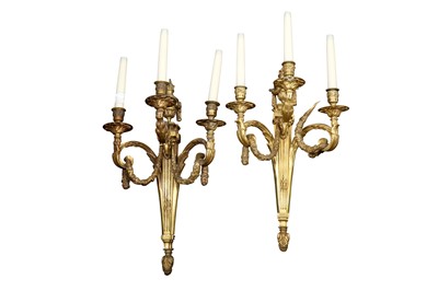 Lot 444 - A PAIR OF FRENCH BRONZE THREE LIGHT WALL APPLIQUES, IN THE LOUIS XVI STYLE, 20TH CENTURY