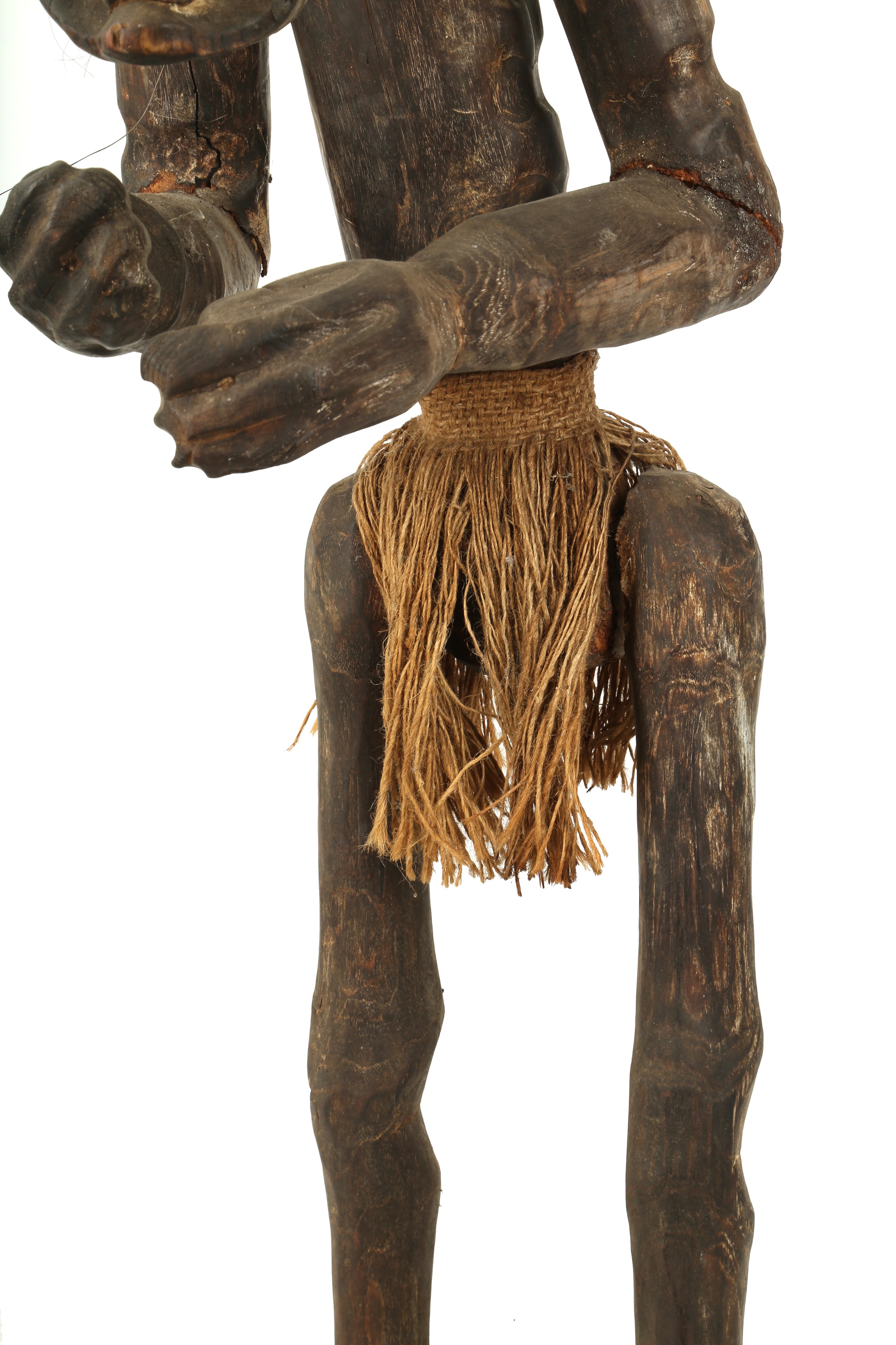 Lot 40 A CARVED WOODEN TRIBAL FIGURE