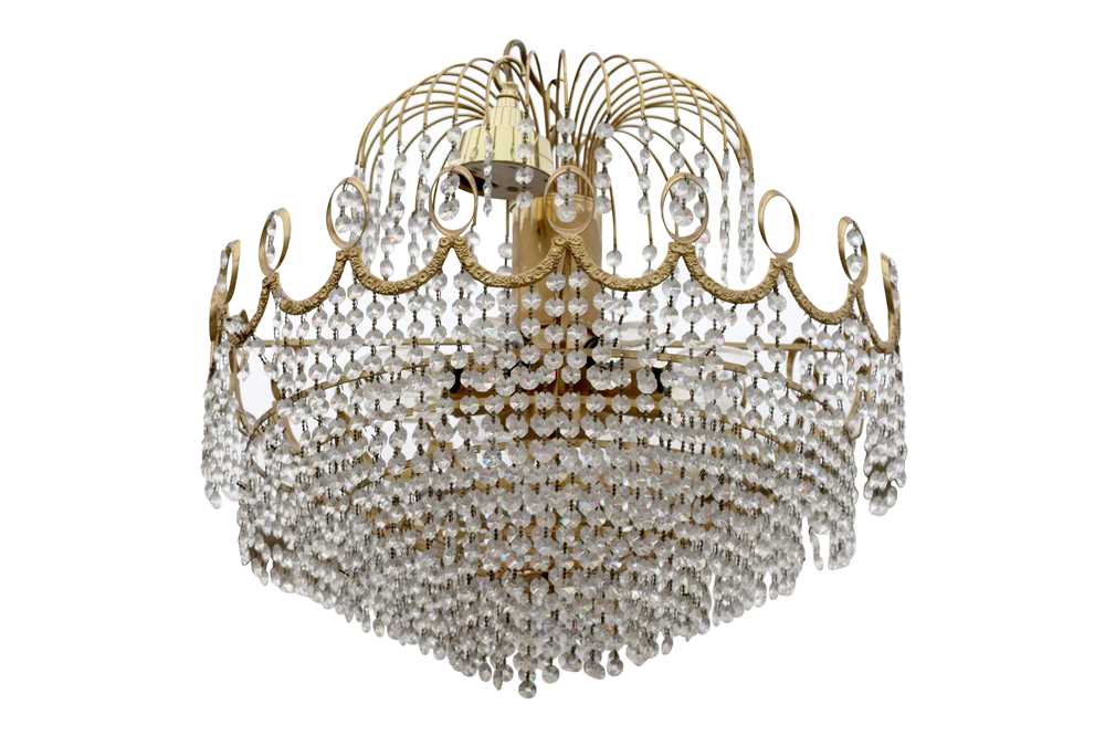 Lot 84 - A GILT METAL AND LUSTRE HUNG EIGHT LIGHT CHANDELIER, 20TH CENTURY