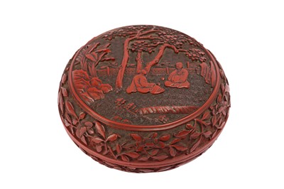 Lot 605 - A CHINESE CINNABAR LACQUER CIRCULAR BOX AND COVER.