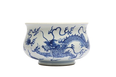 Lot 676 - A CHINESE BLUE AND WHITE 'DRAGON' INCENSE BURNER.