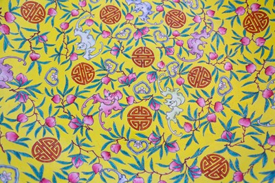 Lot 280 - A CHINESE FAMILLE ROSE YELLOW-GROUND 'BATS AND PEACHES' CHARGER.