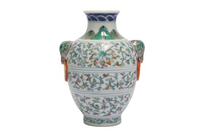Lot 946 - A SMALL CHINESE DOUCAI VASE.