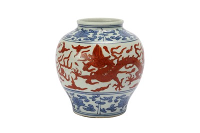 Lot 441 - A CHINESE BLUE AND WHITE AND OVERGLAZE RED 'DRAGON' VASE.