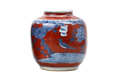 Lot 216 - A CHINESE BLUE AND WHITE AND A RED-GLAZED JAR