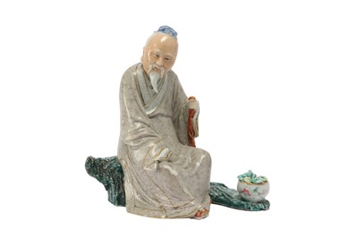 Lot 782 - A CHINESE FAMILLE ROSE FIGURE OF A SCHOLAR.