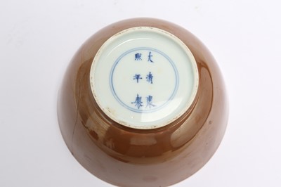 Lot 299 - A CHINESE BROWN-GLAZED BOWL.