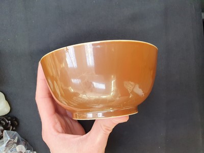 Lot 299 - A CHINESE BROWN-GLAZED BOWL.