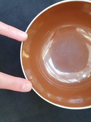 Lot 197 - A CHINESE BROWN-GLAZED BOWL.