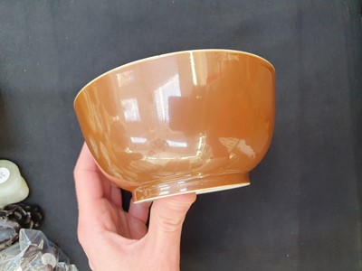 Lot 74 - A CHINESE BROWN-GLAZED BOWL.