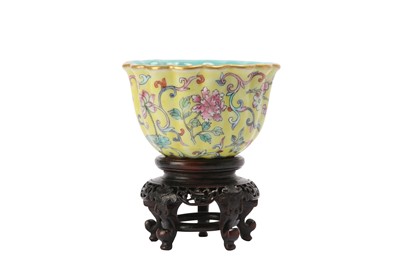 Lot 844 - A CHINESE FAMILLE ROSE YELLOW-GROUND CUP.