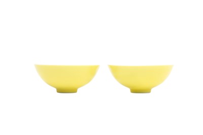 Lot 113 - A PAIR OF CHINESE YELLOW-GLAZED CUPS