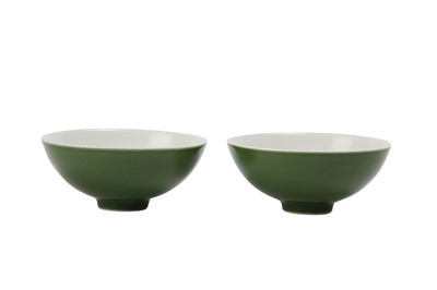Lot 112 - A PAIR OF CHINESE GREEN-GLAZED CUPS