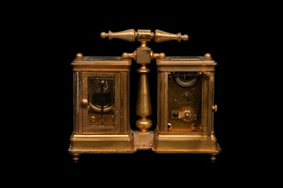 Lot 296 - A GILT BRONZE DESK COMPENDIUM WITH CARRIAGE CLOCK AND BAROMETER