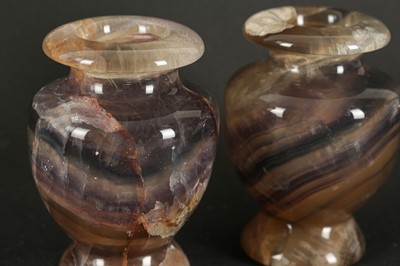 Lot 92 - A PAIR OF BANDED AGATE VASES