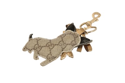 Lot 172 - Gucci Beige Monogram Supreme Dog Handbag Charm