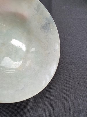 Lot 573 - A PAIR OF CHINESE APPLE-GREEN JADEITE BOWLS.