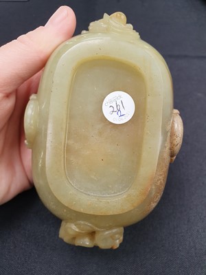 Lot 261 - A CHINESE YELLOW JADE WASHER.