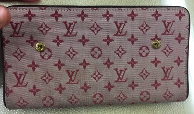 Sold at Auction: Louis Vuitton Monogram Denim Wallet