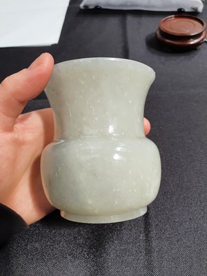 Lot 463 - A CHINESE GREY JADE SPITTOON.