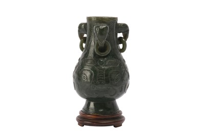 Lot 951 - A CHINESE SPINACH JADE ARCHAISTIC VASE.