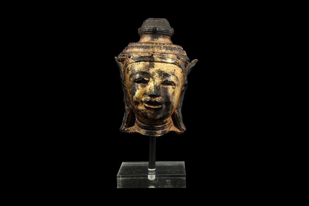 Lot 118 - AN 18TH CENTURY BURMESE DRY LACQUERED AND GILDED BUST OF BUDDHA