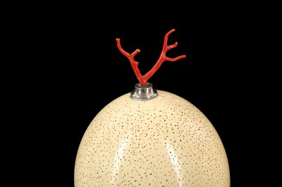 Lot 25 - A PAIR OF MID-CENTURY OSTRICH EGGS MOUNTED WITH MEDITERRANEAN CORAL