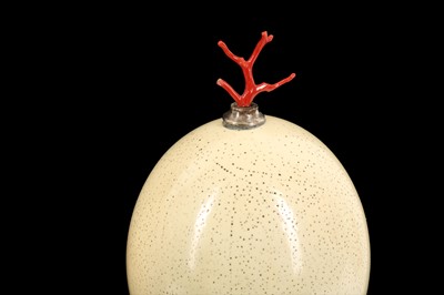 Lot 322 - A PAIR OF MID-CENTURY OSTRICH EGGS MOUNTED WITH MEDITERRANEAN CORAL