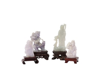 Lot 804 - FOUR CHINESE JADE AND JADEITE FIGURES.